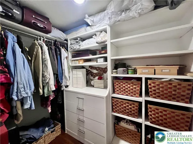 Nice organizer in primary bedroom closet.