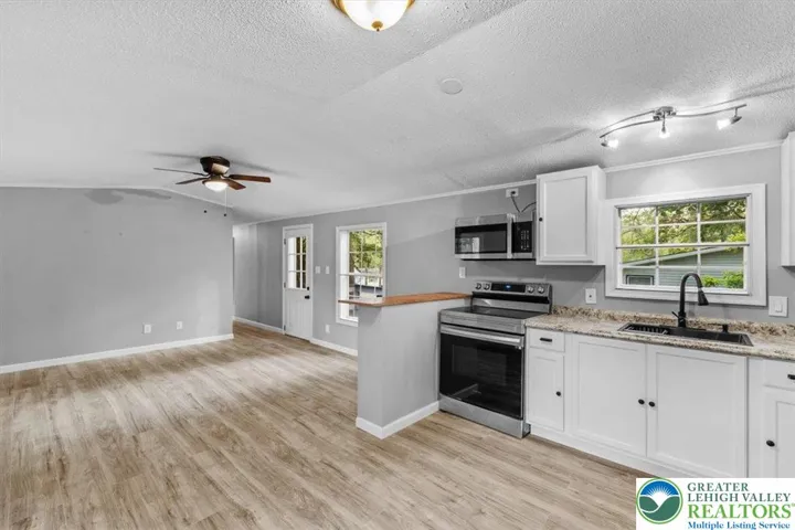 Open Concept Living & Dining Areas