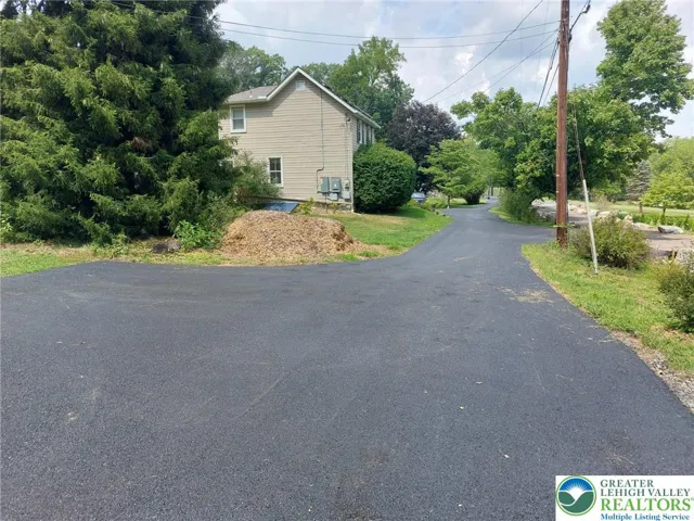 Newly paved driveway with added turnaround