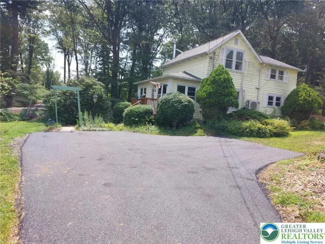Newly paved driveway with added turnaround