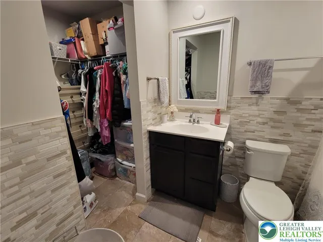 Walk in closet in Primary Bathroom