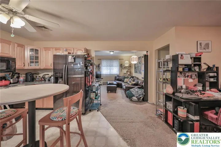 Open Concept - View from Kitchen to Living Room (Dining to the Right)