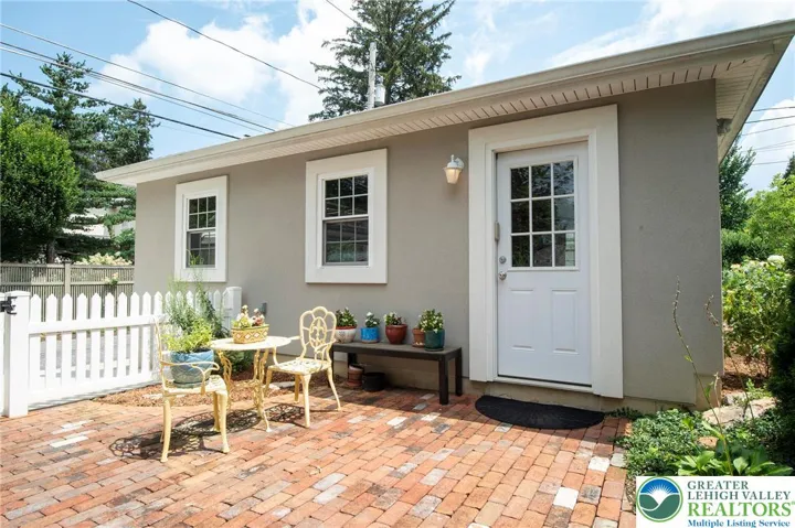 The 24X24' detached garage with hip roof was constructed by owners in 2017. Direct man door access to patio.