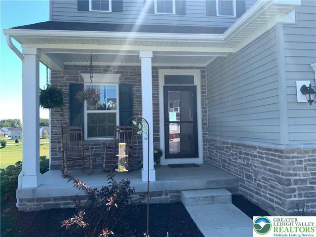 Covered entry and transom window