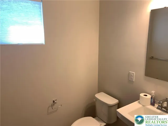 1st floor powder room with high window