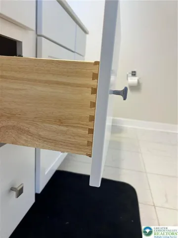 Quality drawer construction, ceramic tile floor