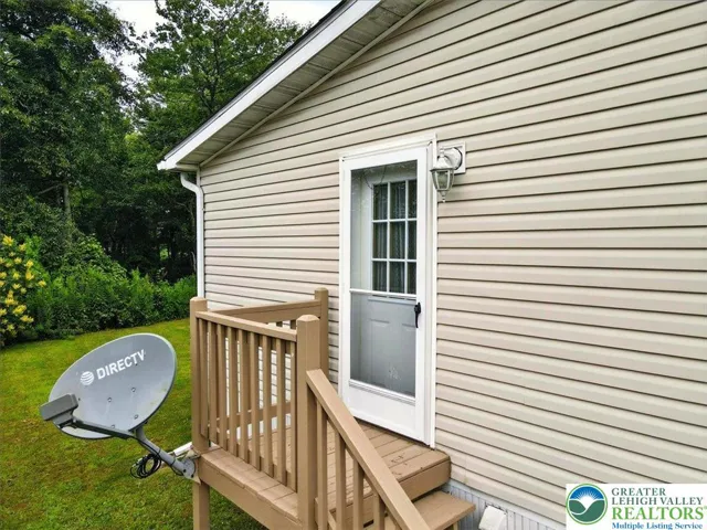 Side door of home on left from front