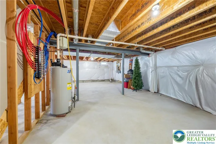 Insulated basement foundation walls and PEX plumbing ManaBloc