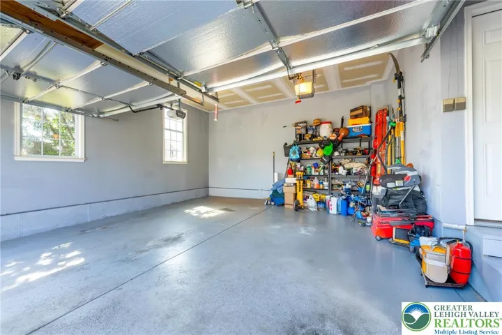Side entry garage leading to mudroom