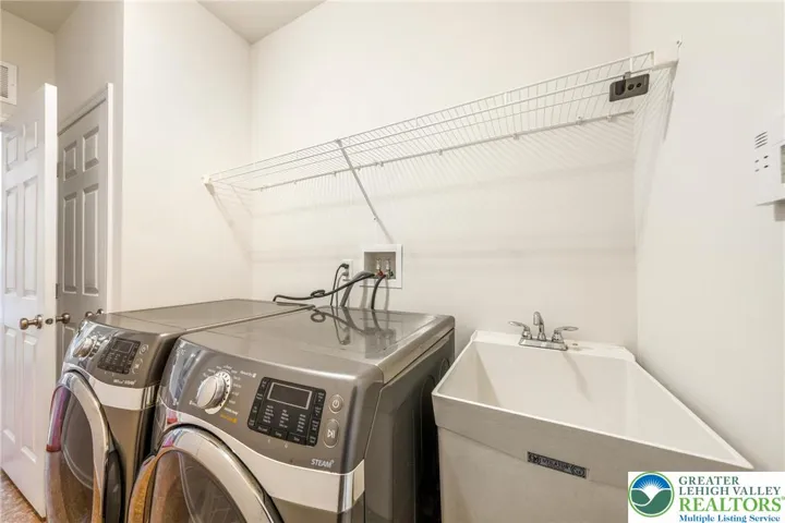 Laundry/Mudroom with coat closet