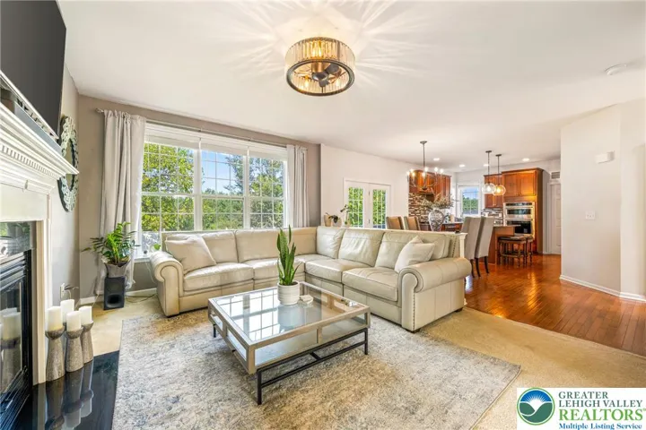 Family room with adjacent kitchen and breakfast area
