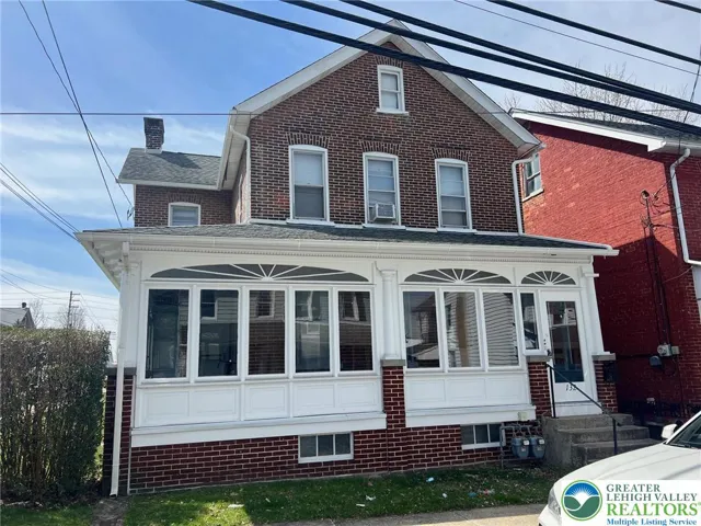 Front of property with shared sunroom