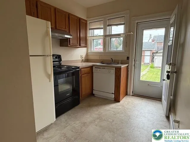 Kitchen with access from rear door