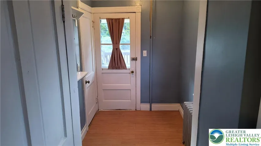 Mud room to deck and back yard
