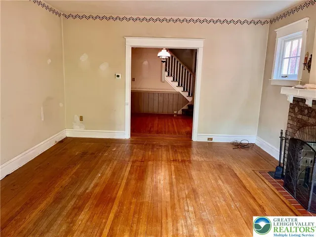 Living room looking into dining room.