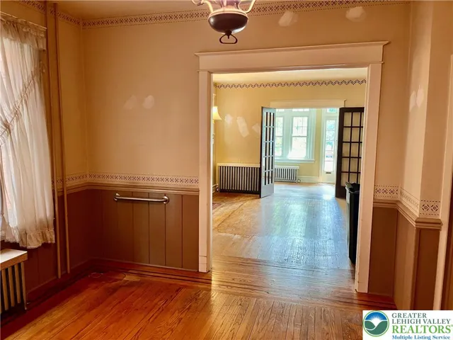Hardwood floors DR, LR, sunroom.