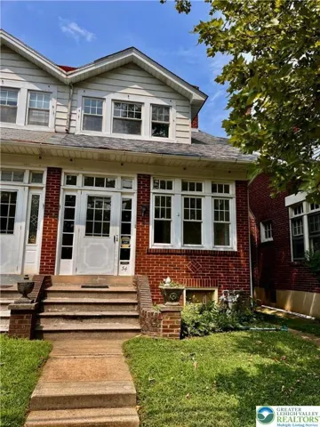 Bright sunny front of house.