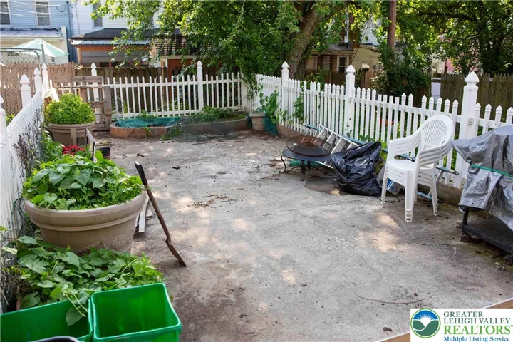 Patio for low maintenance outdoor living space.