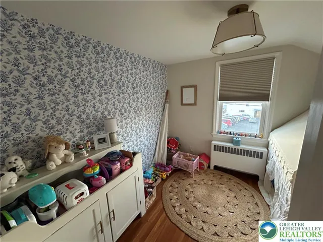 Bedroom 3 with H/W flooring