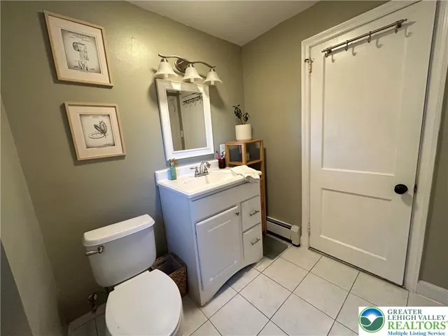 2nd floor full bath rm with tile flooring