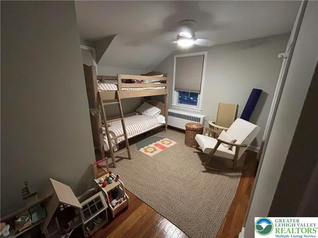 Bedroom 2 with lighted ceiling fan