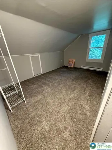 3rd floor bedroom with lots of storage space.