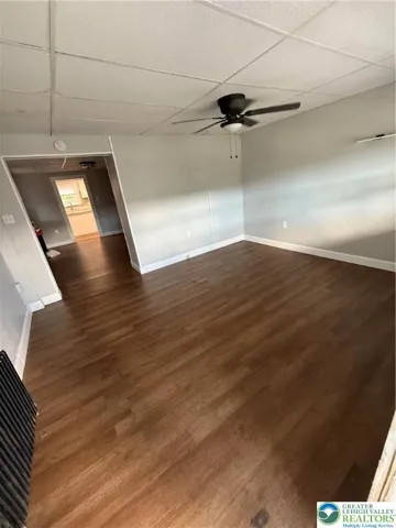 Living room that flows into the dining room.