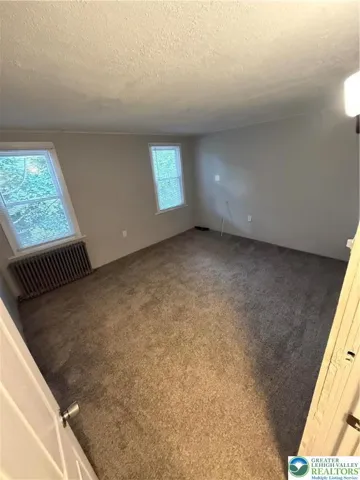 2nd bedroom with access to the 3rd floor bedroom.