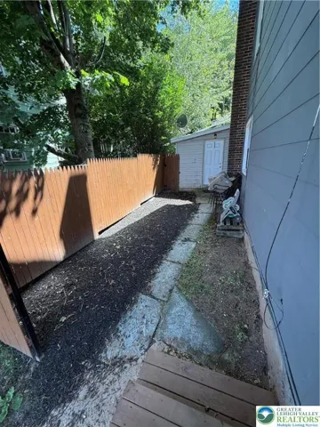 Newly fenced side yard for privacy and pets!