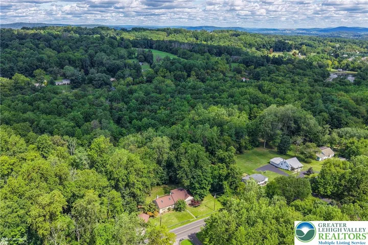 Acreage and residence with Moyer's Lake near upper right corner