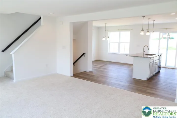 View from family rm - looking into kitchen & dining area