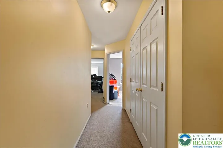 2nd Floor Hallway with laundry room closet