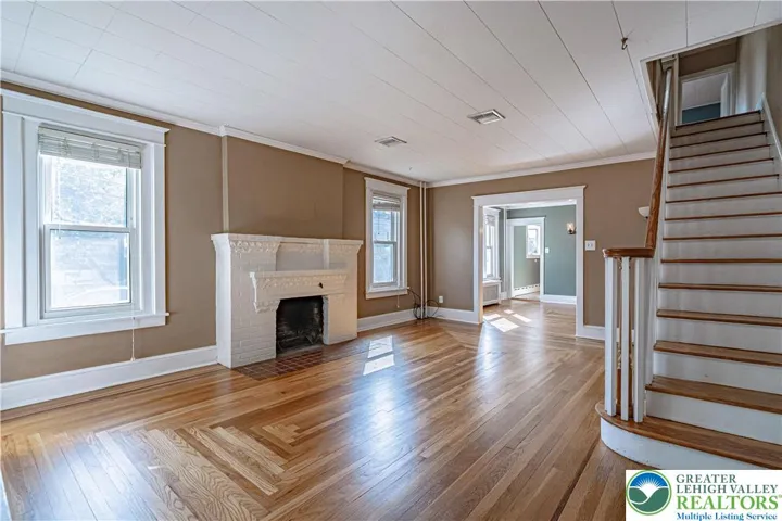 All natural light and original hardwood floor