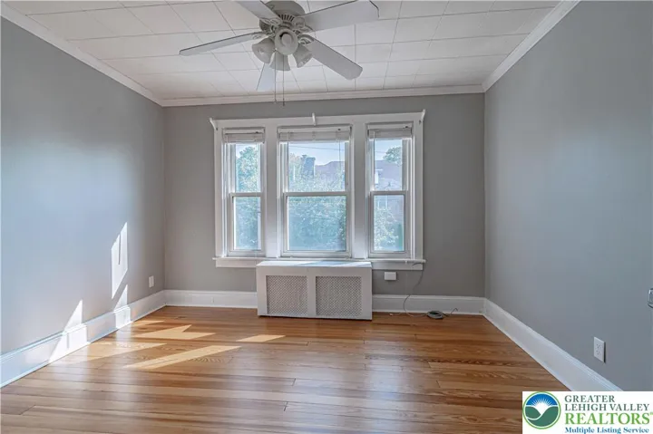 2nd-Middle BR with beautiful hardwood floor.
