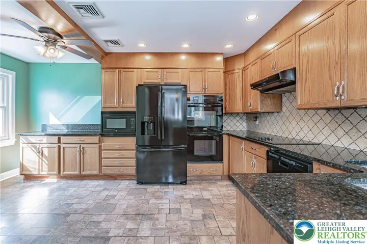 Granite countertops and backsplash.