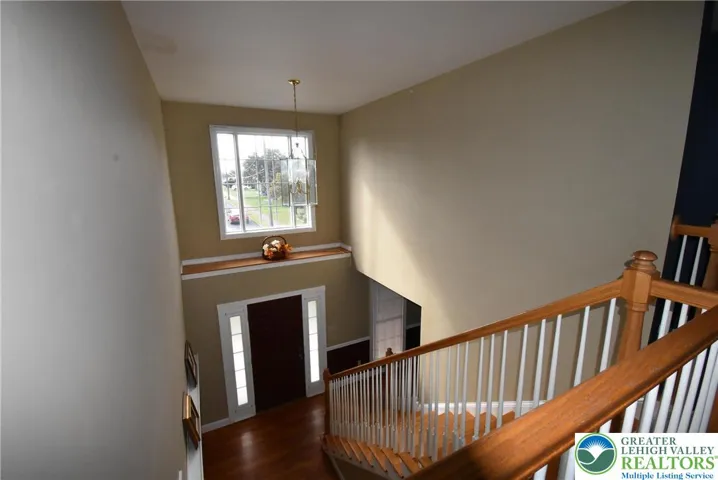 Grand Foyer with Large Window & Decorator Shelf