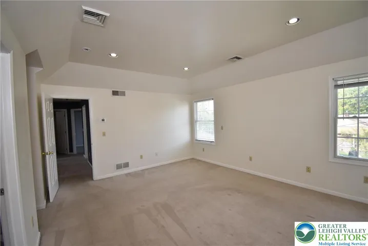 Primary Bedroom with Tray Ceiling