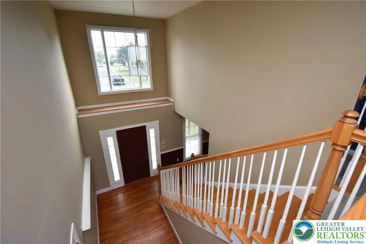 Grand Foyer with Large Window & Decorator Shelf