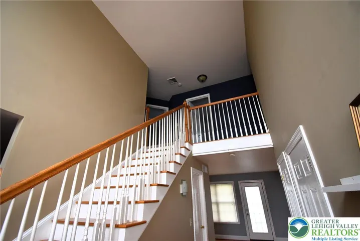 Grand Foyer with Large Window & Decorator Shelf