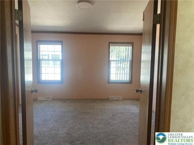 French doors off the bathrm to bedroom