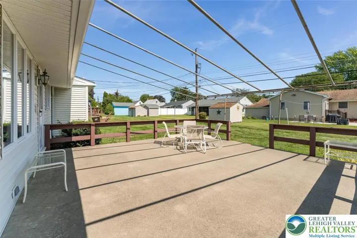 Awning matches front awnings