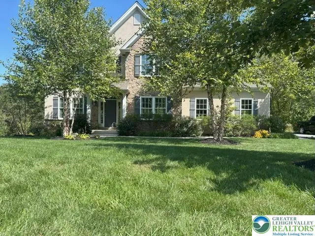 Stunning home located in Millbrook Farms in East Penn School District