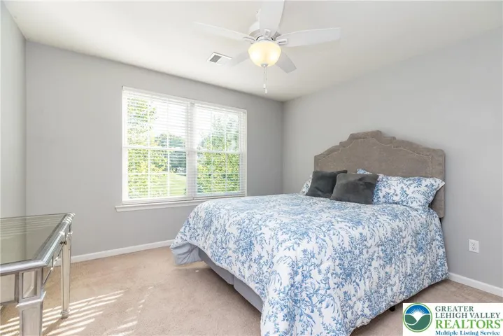 Bedroom 3 with ceiling fan/light combo
