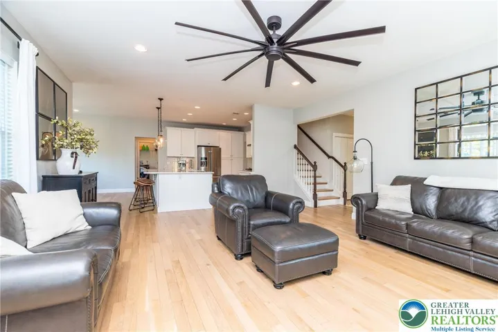 Great room with ceiling fan