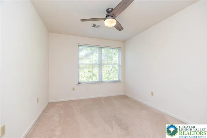 Bedroom 4 with ceiling fan/light combo