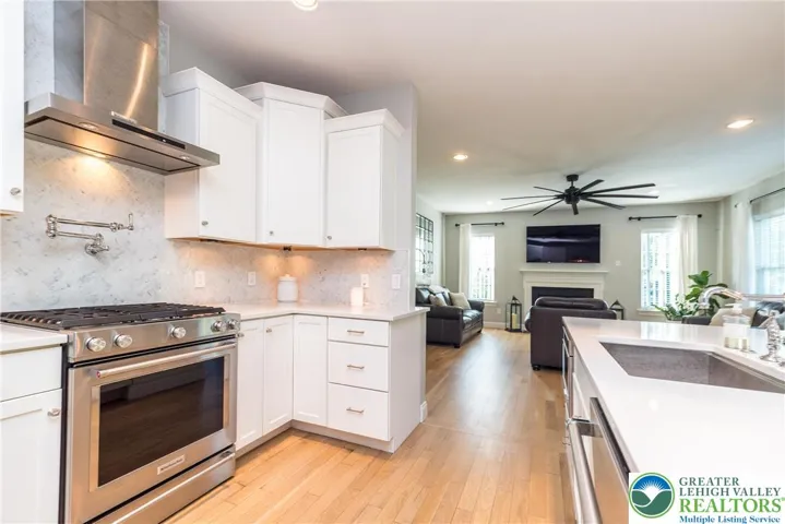 The kitchen is open to the great room. Same hardwood floors through out the first floor were refinished
