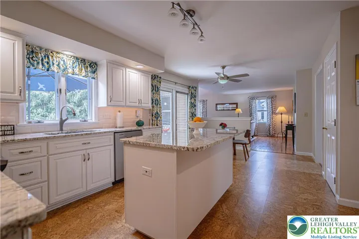Kitchen flows into Family Room
