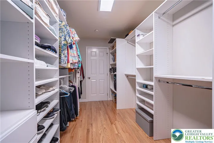 Primary walk-in closet w/door to attic