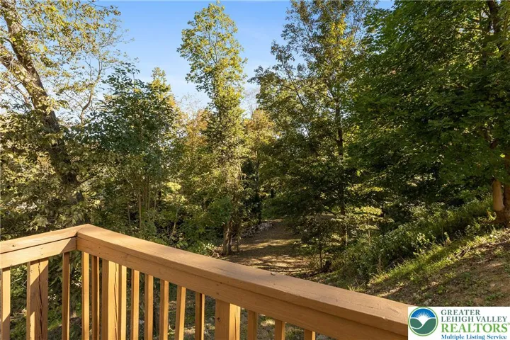 Deck off the kitchen, you can hear and see the Creek!
