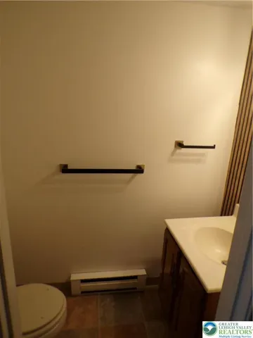 1st floor powder room toilet & sink